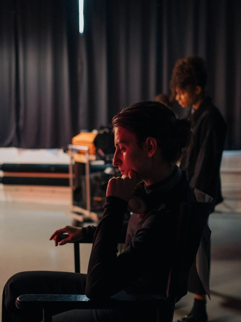 Portrait of curator Anika Sølver at her desk